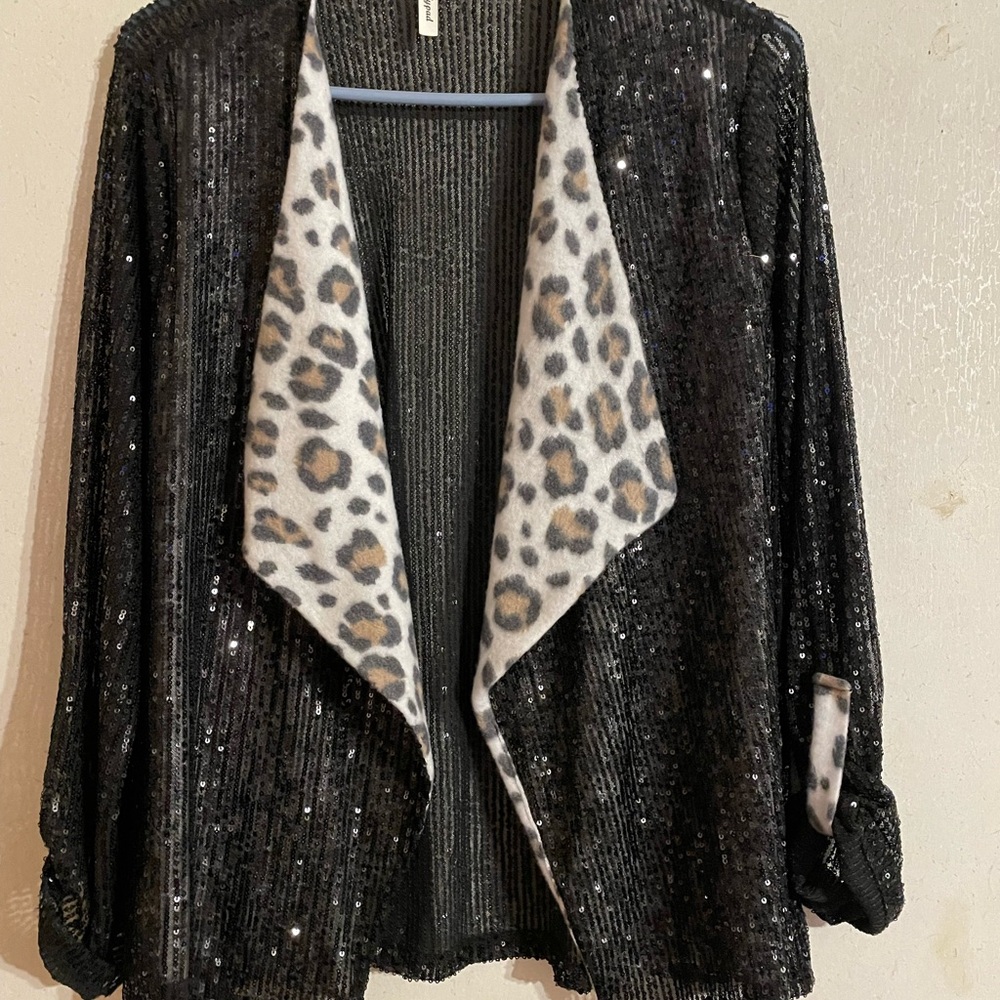 Black Sequin Jacket with Leopard Print Lining. New without tags.